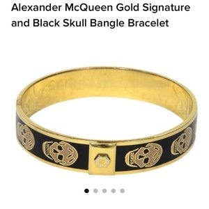 ISO Alexander McQueen black gold skull bracelets